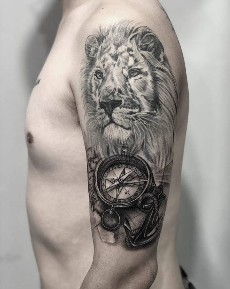 狮子指南针纹身图片_手臂欧美写实纹身图案
