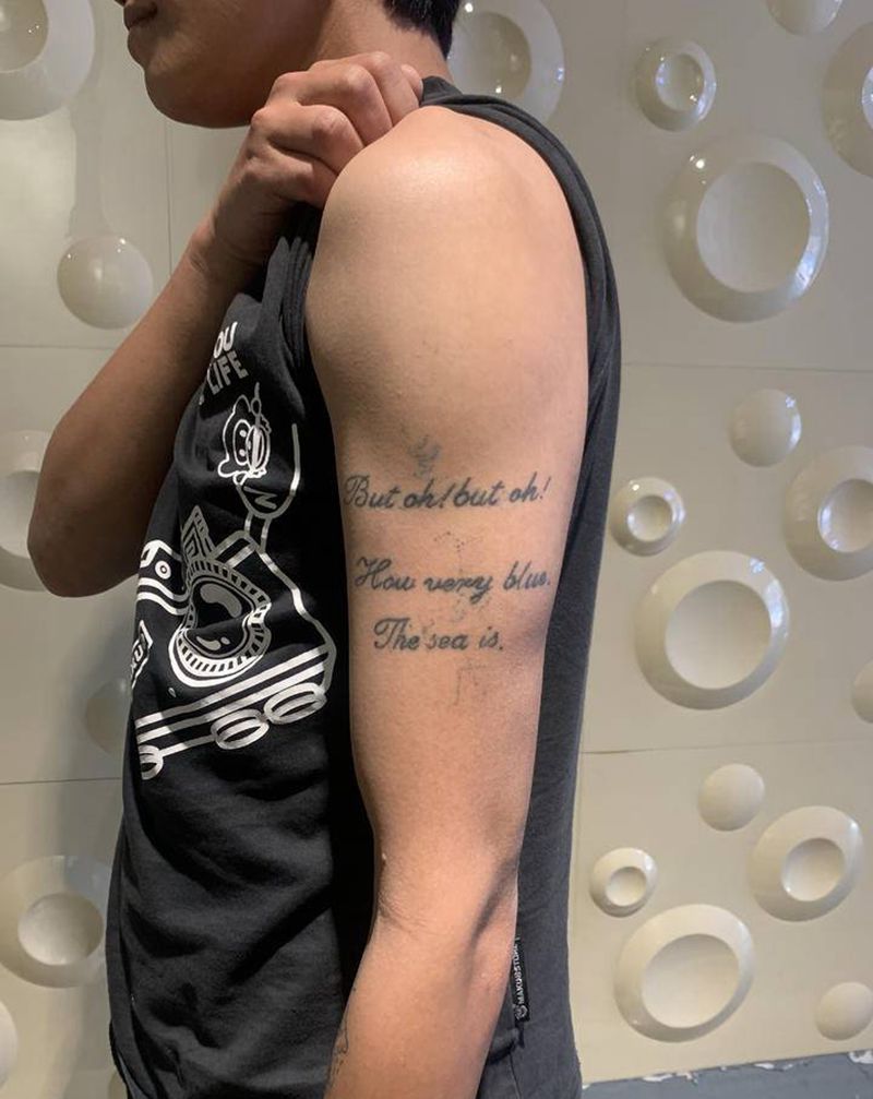 鲤鱼遮盖纹身图片_手臂纹身图案