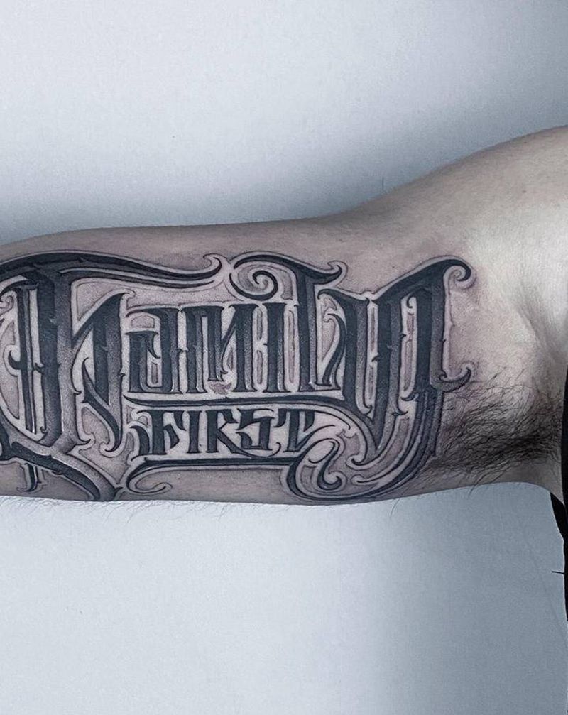 花体字纹身图片_手臂花体字纹身图案