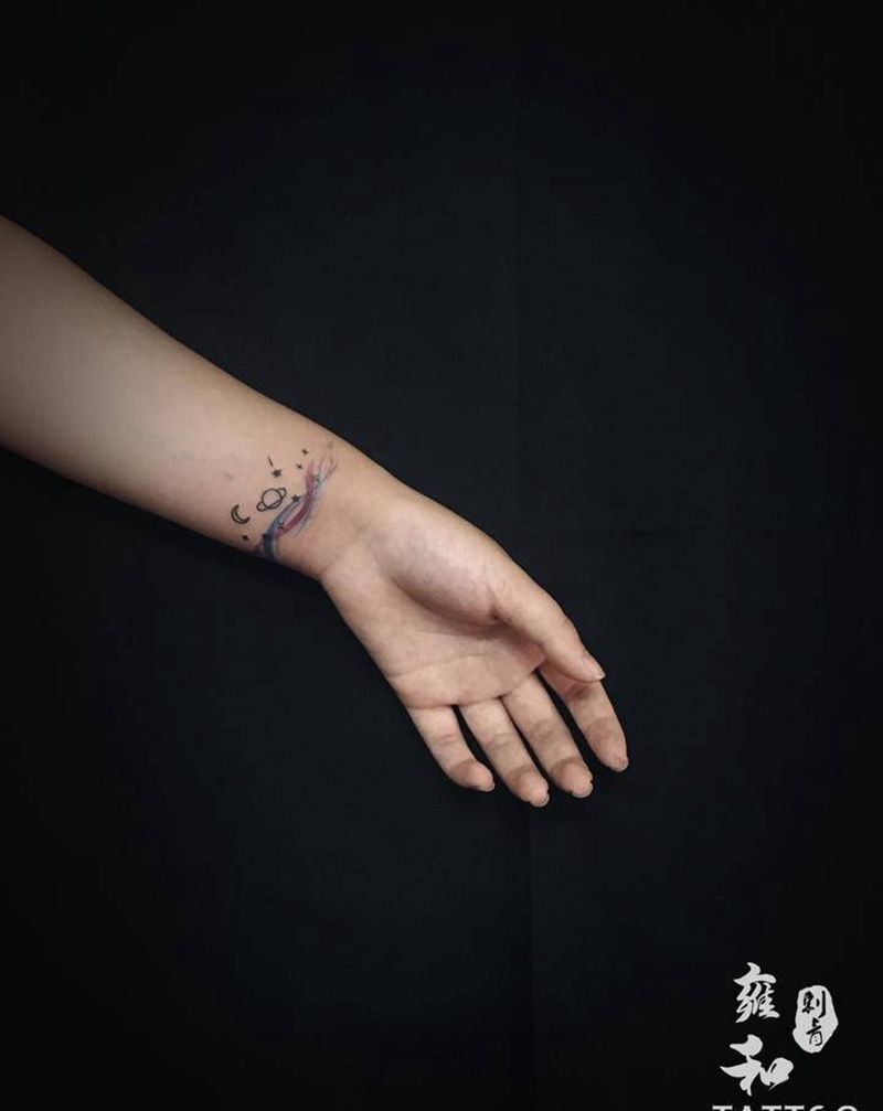 宇宙。纹身图片_手臂纹身图案