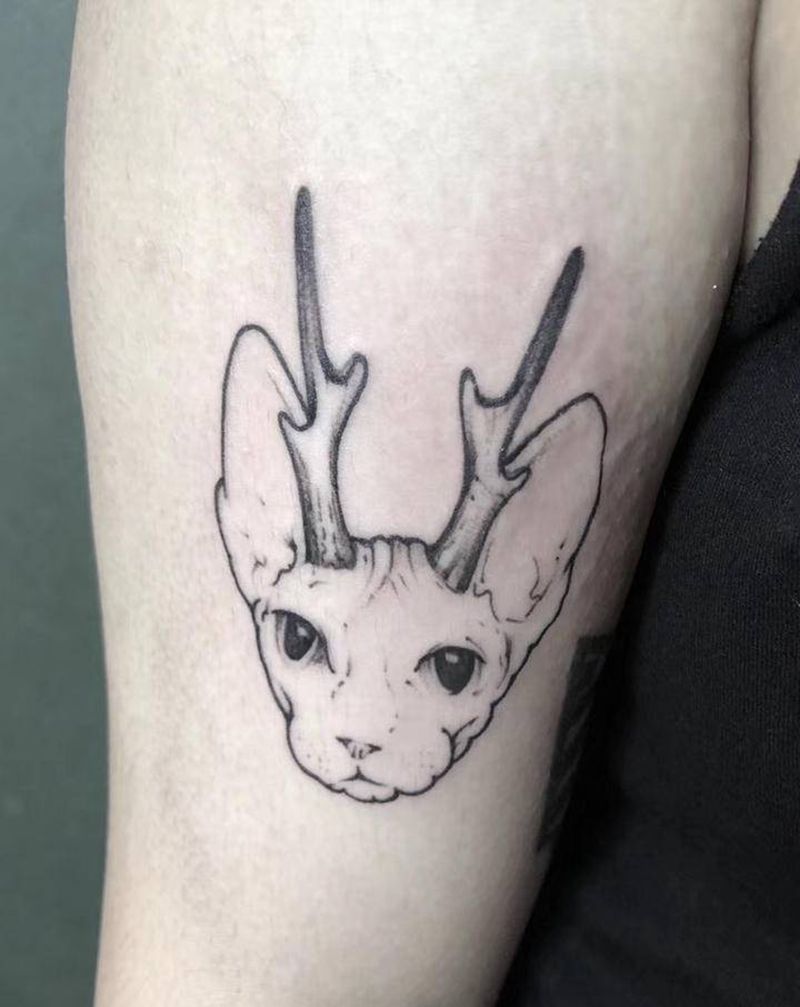 带角的比鲁斯纹身图片_手臂纹身图案