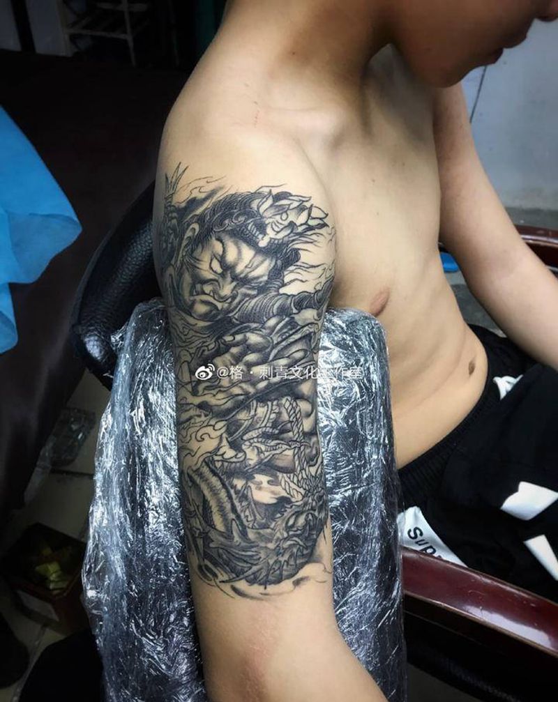 不动明王纹身图片_手臂纹身图案