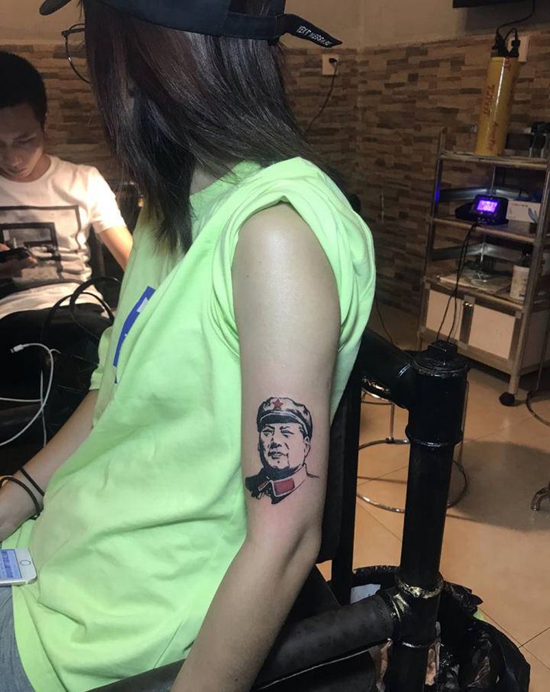 毛爷纹身图片_手臂纹身图案