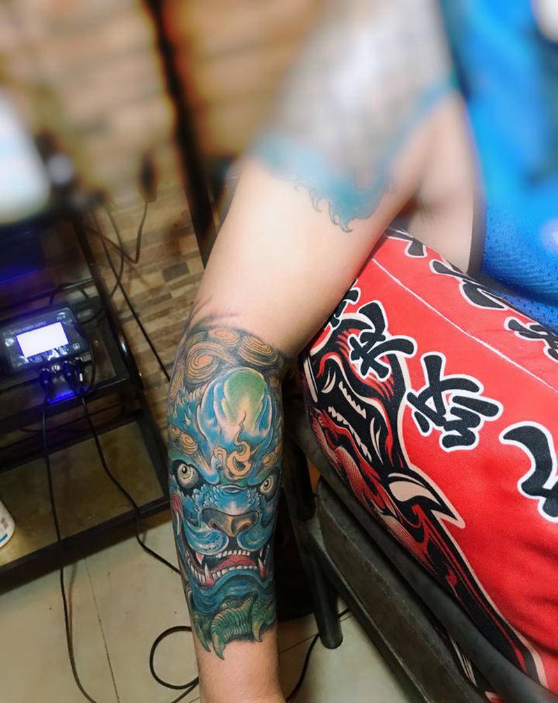 唐狮纹身图片_手臂纹身图案