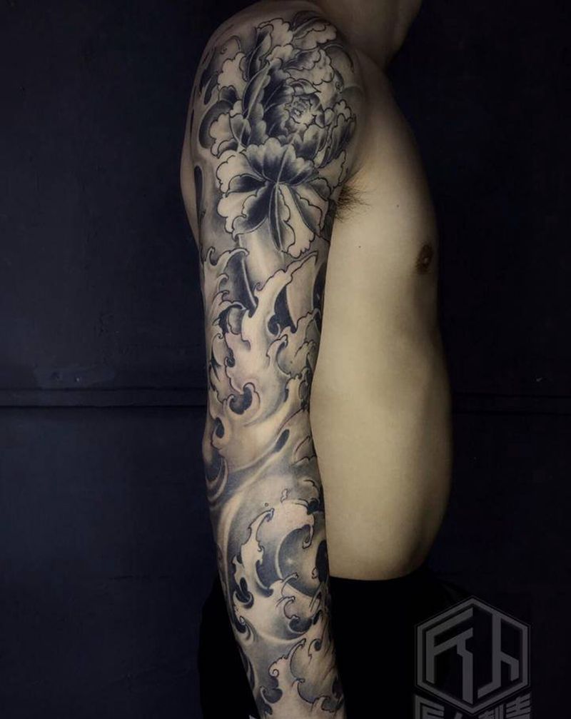 浪臂纹身图片_手臂纹身图案