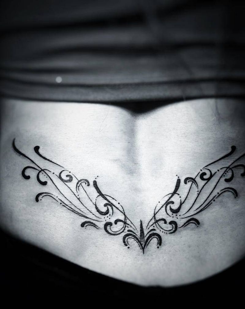 图腾纹身图片_腰部背部图腾点刺图腾纹身图案