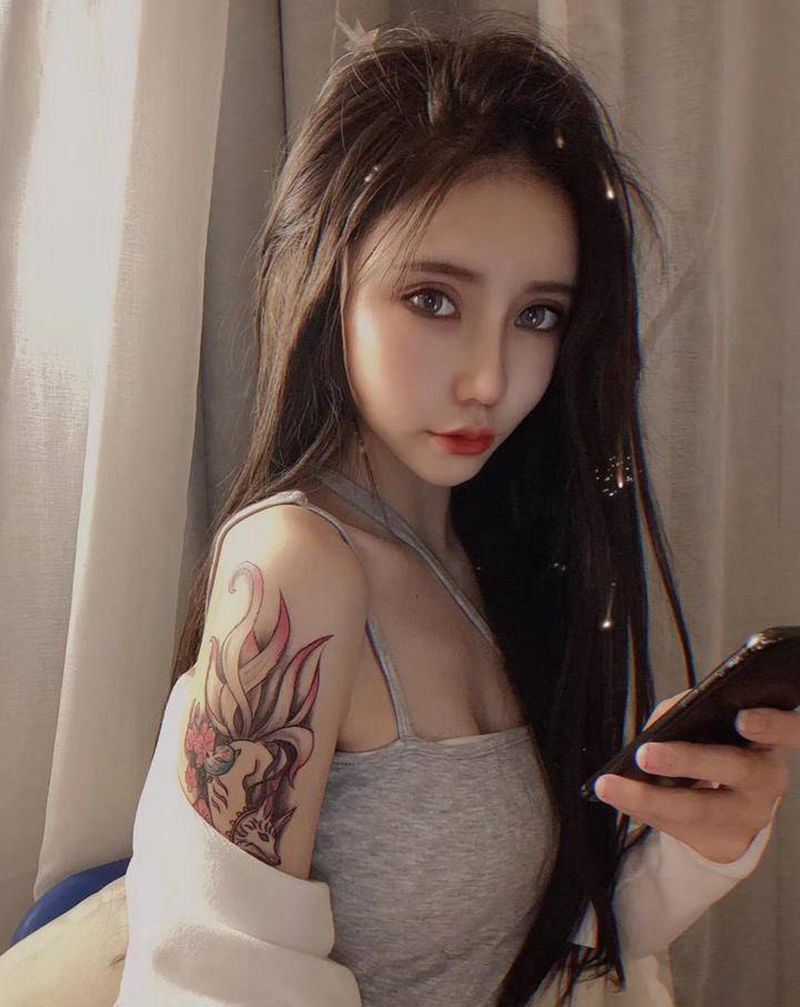 九尾狐纹身图片_手臂老传统纹身图案