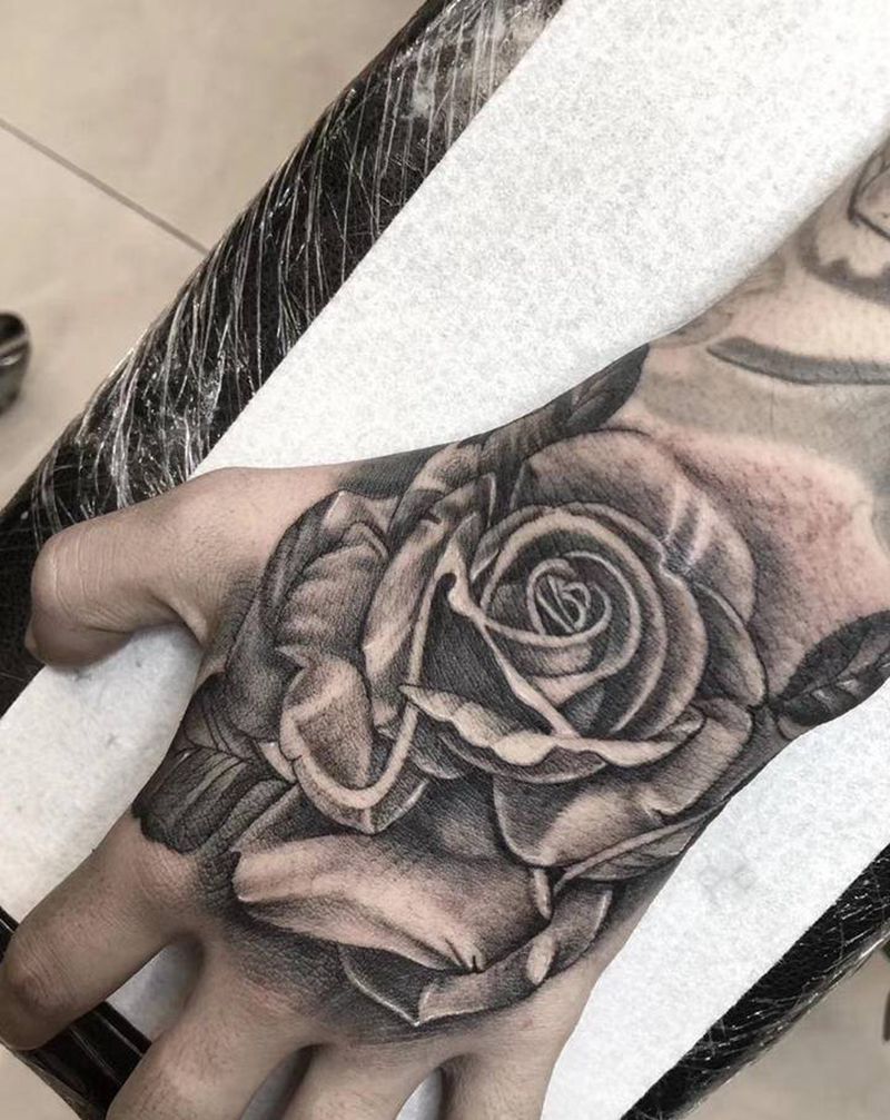赠人玫瑰，手留余香纹身图片_手部纹身图案