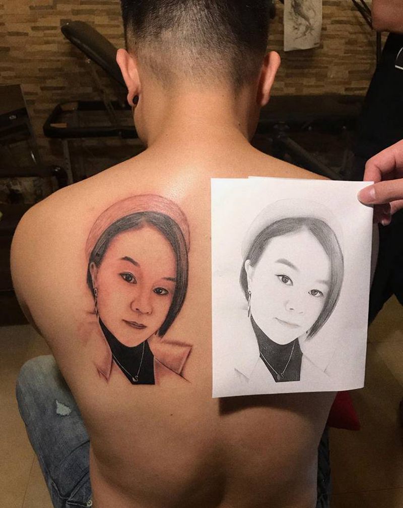 人物肖像纹身图片_背部欧美写实纹身图案