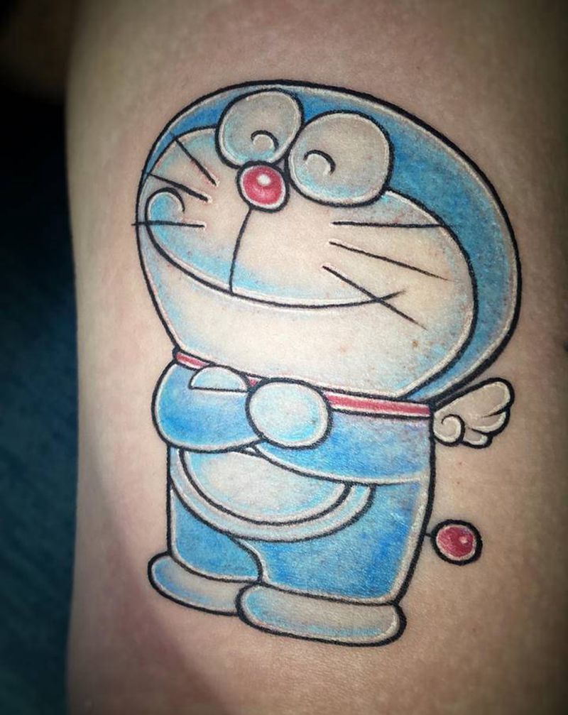 哆啦A梦纹身图片_手臂背部水彩New School哆啦A梦小清新情侣纹身图案