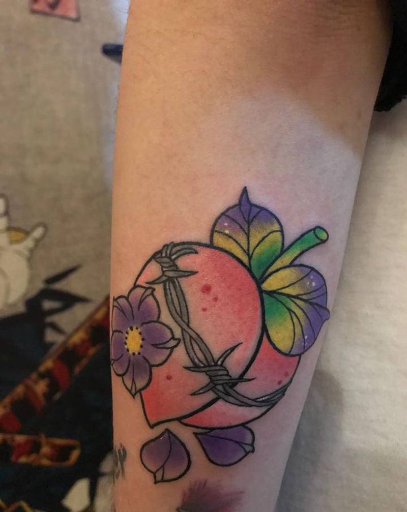 桃儿纹身图片_手臂纹身图案