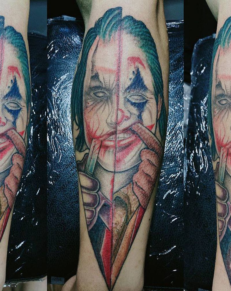 小丑纹身图片_手臂脚部欧美写实New School小丑彩色半臂纹身图案