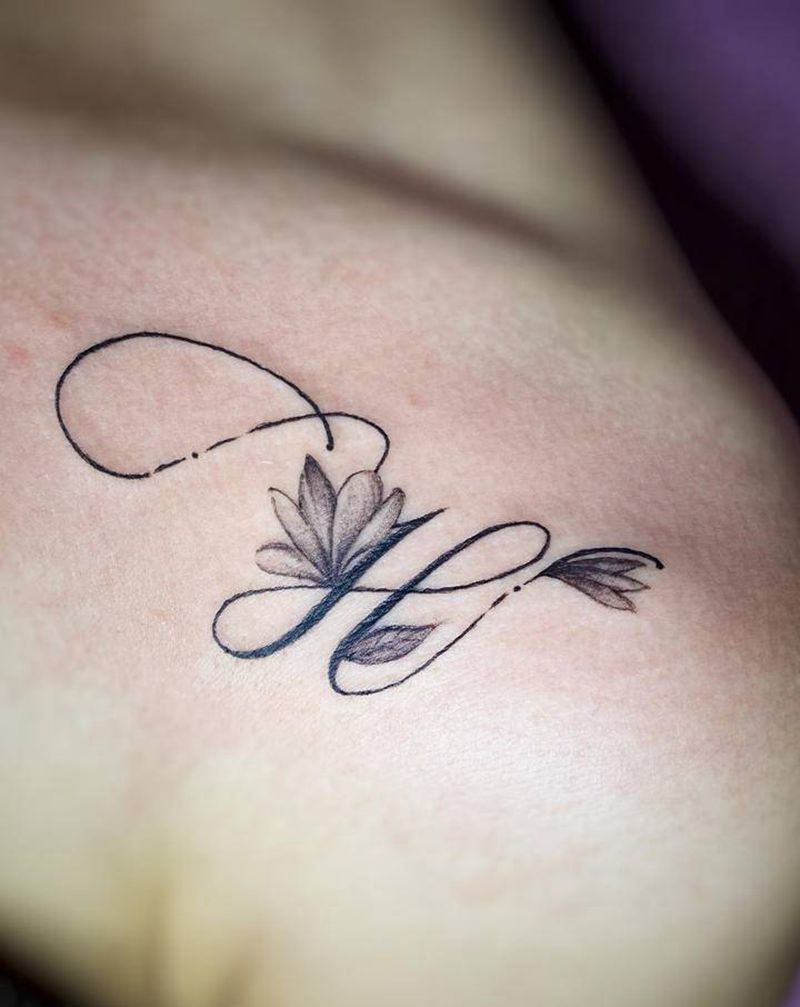 闺蜜纹身纹身图片_肩部手臂花体字点刺字母素花纹身图案