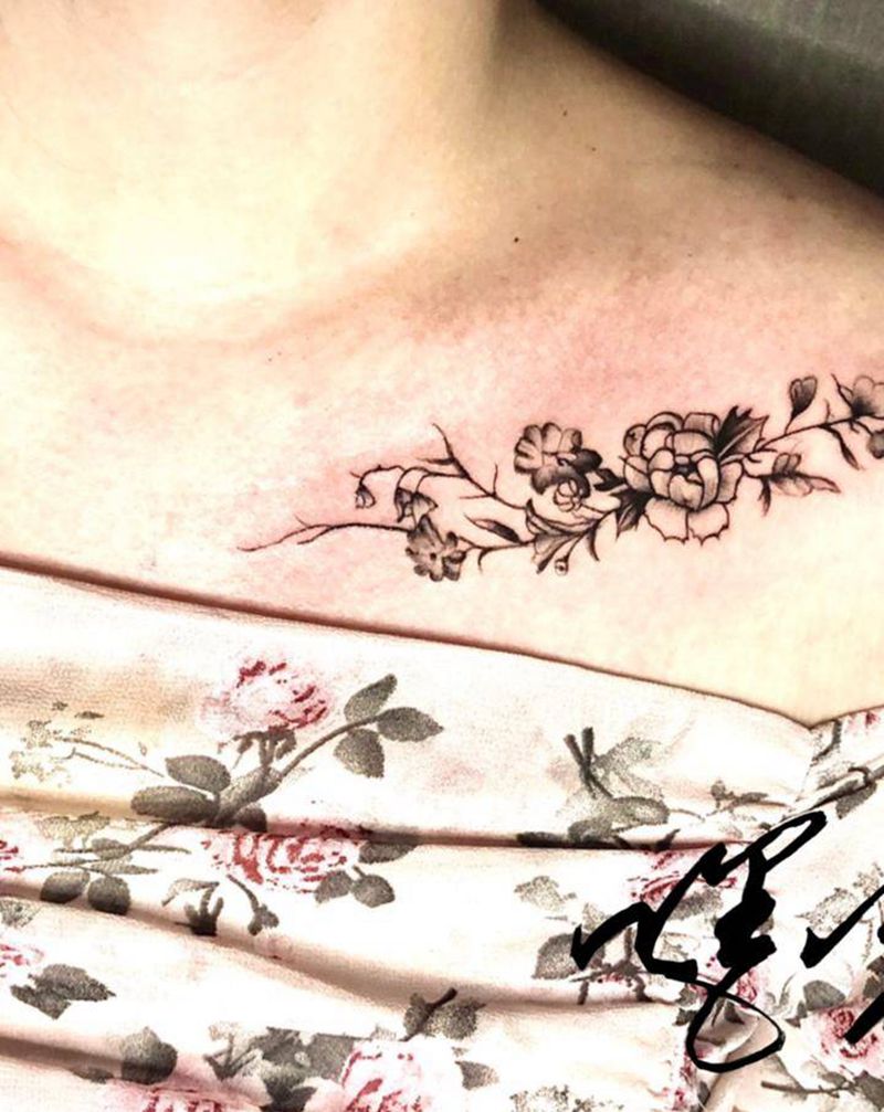 素质纹身图片_肩部点刺素花纹身图案