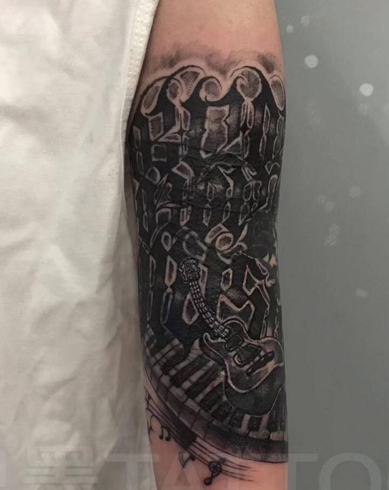 花体遮盖纹身图片_手臂纹身图案