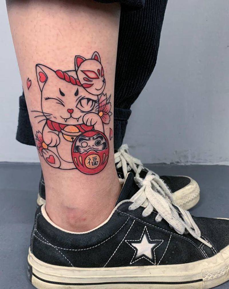 招财猫纹身图片_腿部纹身图案