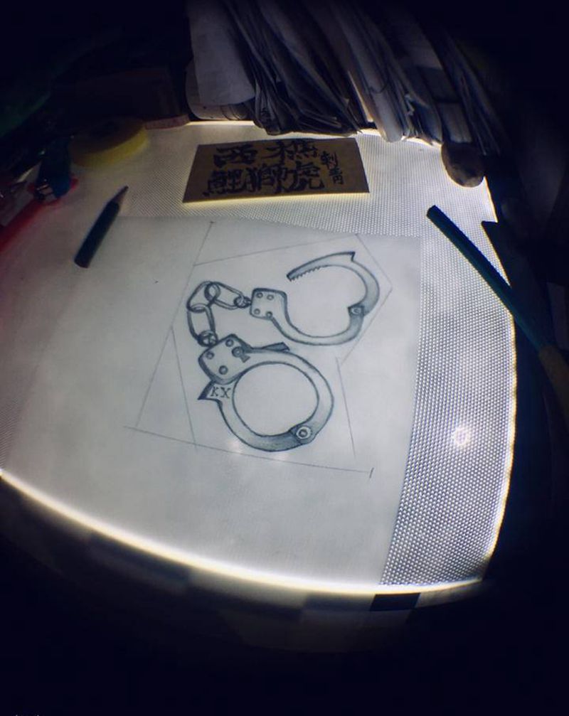 顾客稿手铐纹身图片_手臂纹身图案