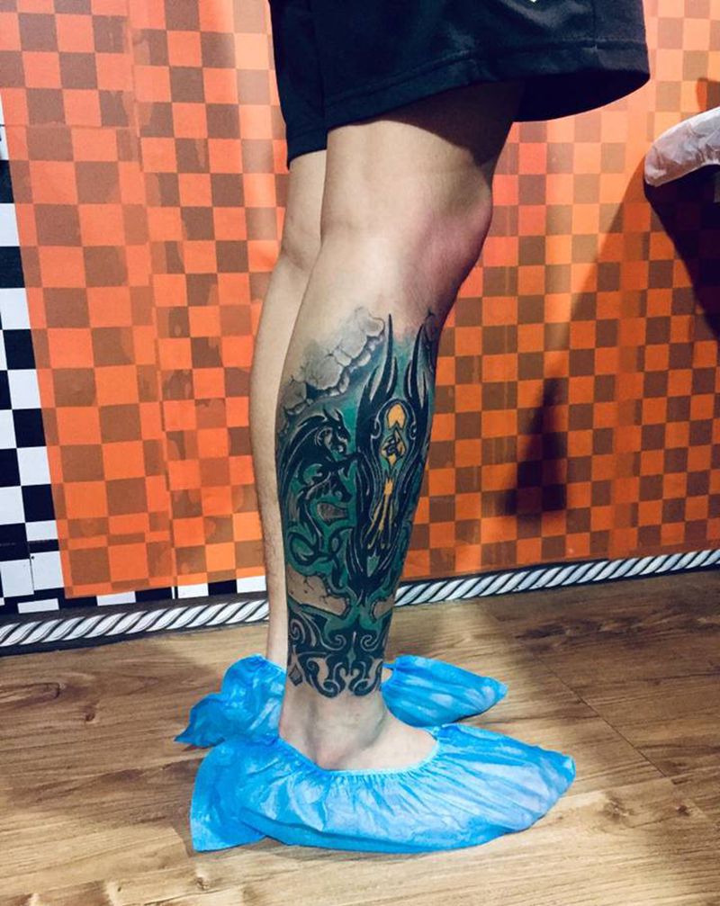 石雕图腾纹身图片_腿部纹身图案