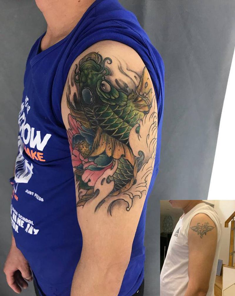 鲤鱼遮盖纹身图片_手臂手部新传统纹身图案