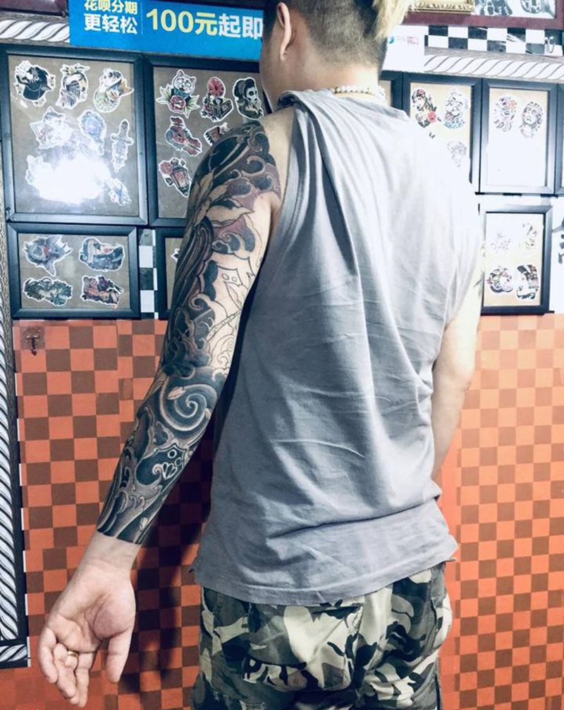 今天工时未完成待继续纹身图片_手臂纹身图案