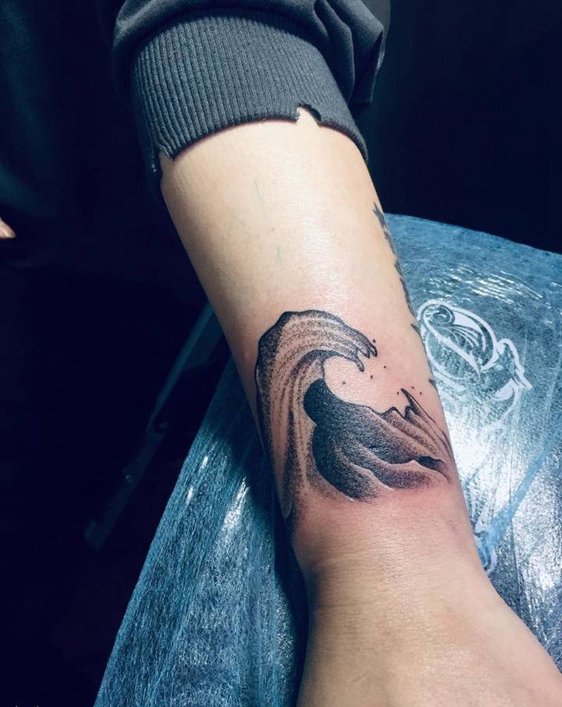 海浪遮盖纹身图片_手臂纹身图案