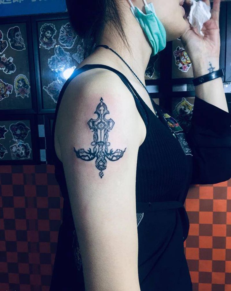 大臂小图纹身图片_手臂纹身图案