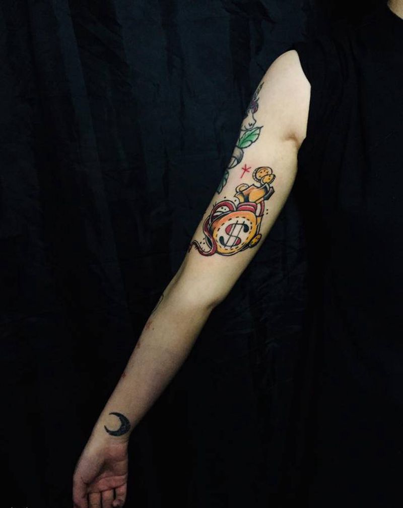 金袋纹身图片_手臂纹身图案