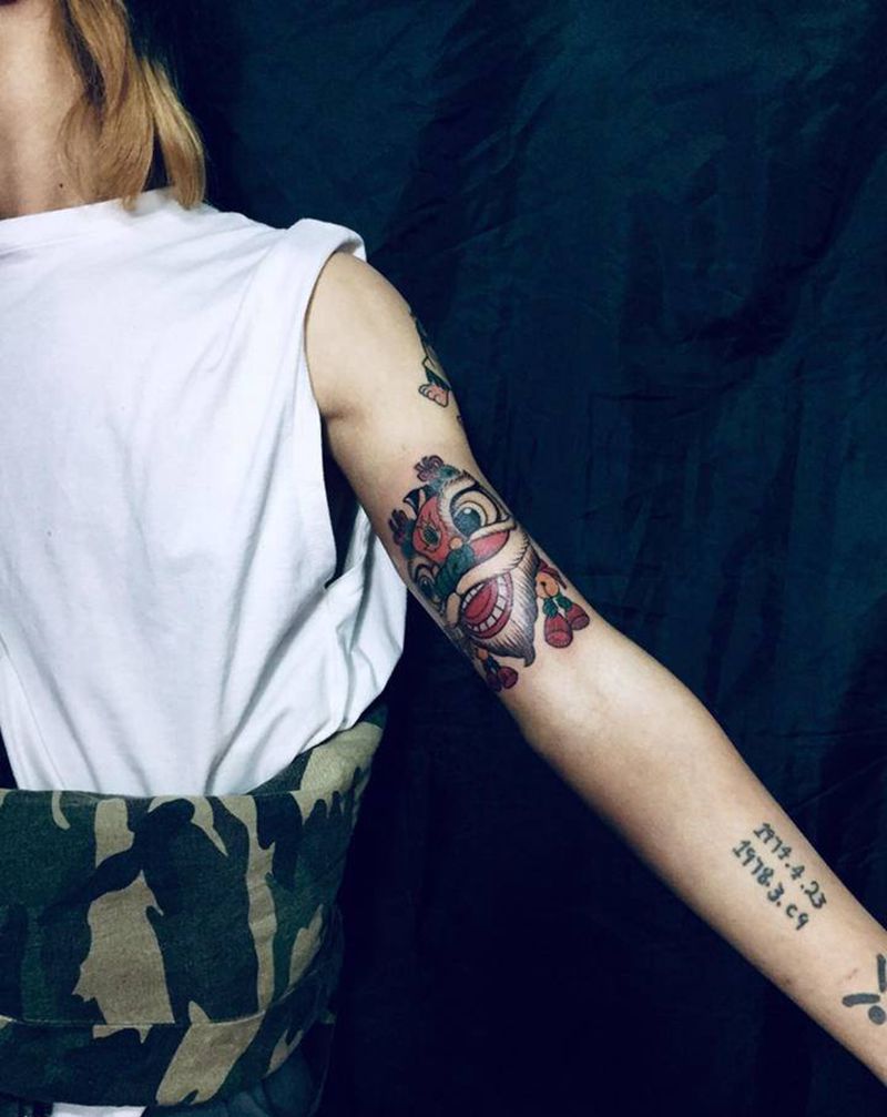 醒狮纹身图片_手臂纹身图案