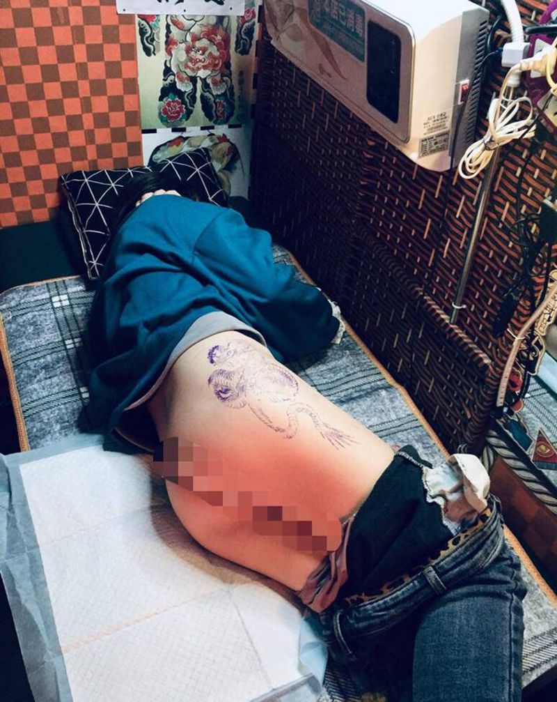 一条龙纹身图片_腰部纹身图案