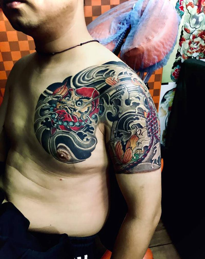 半胛完成纹身图片_手臂胸部纹身图案