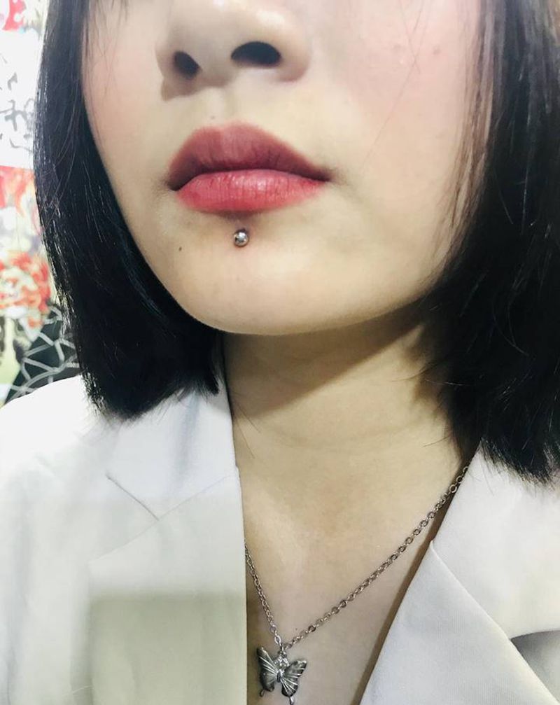 唇钉纹身图片_手臂纹身图案