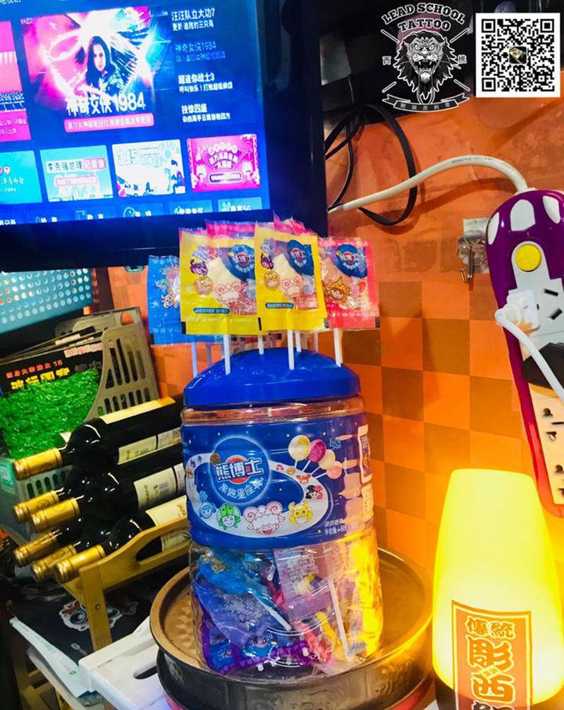 纹身前免费领一根糖纹身图片_手臂纹身图案