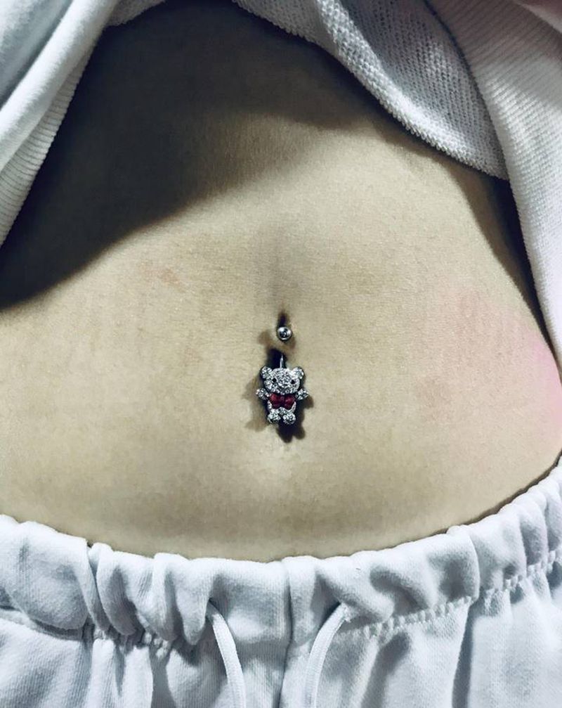 脐钉纹身图片_手臂纹身图案