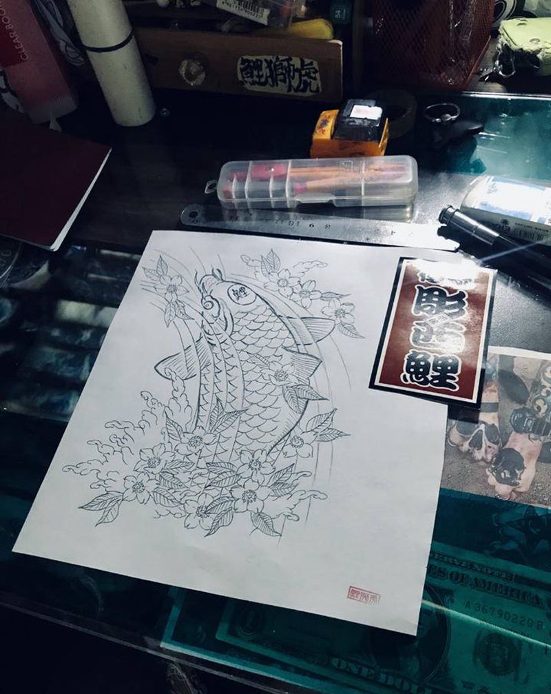 鲤鱼线纹身图片_手臂纹身图案