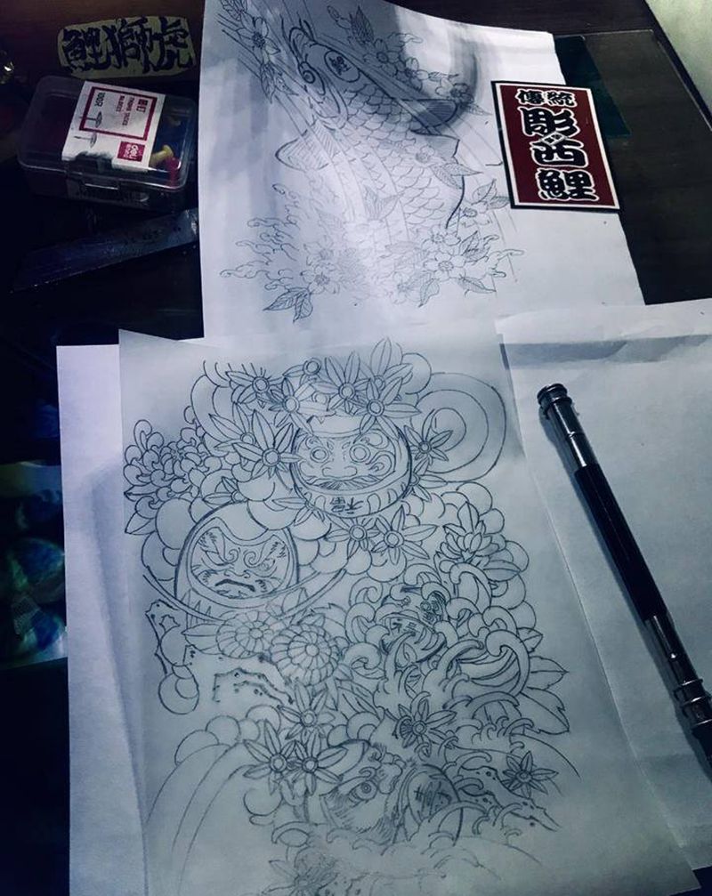 达摩不倒纹身图片_手臂纹身图案