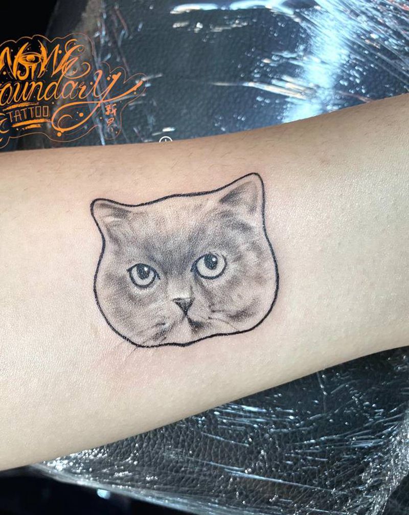客稿猫纹身图片_手臂欧美写实纹身图案