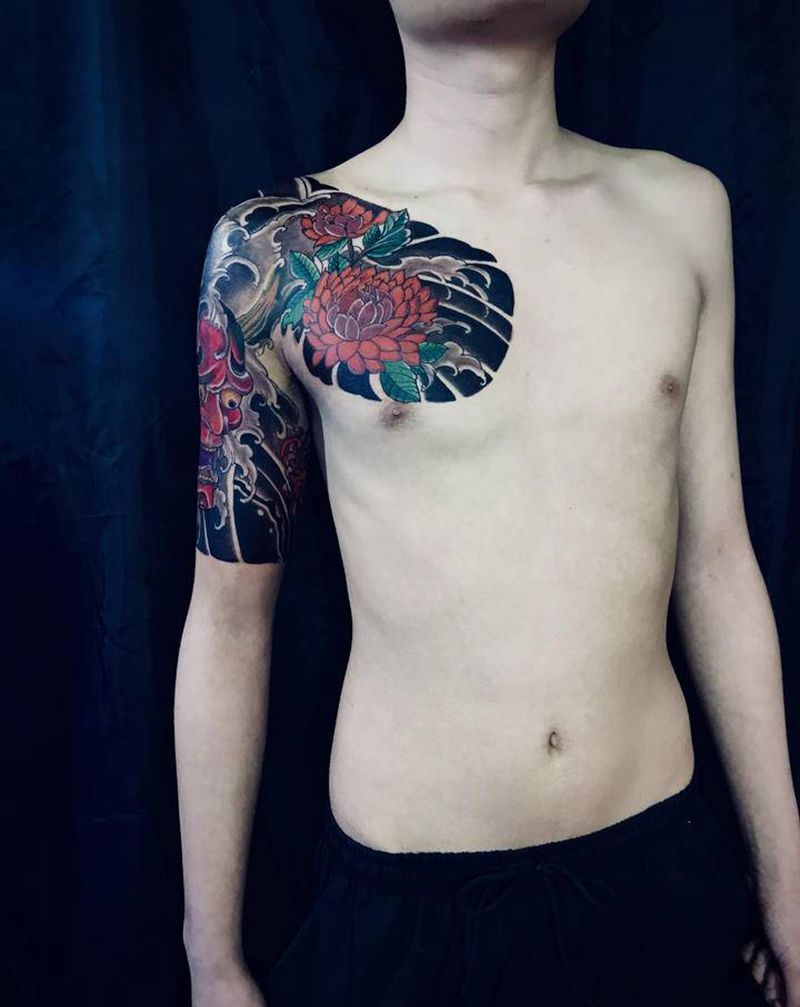 半胛遮盖纹身图片_手臂胸部纹身图案