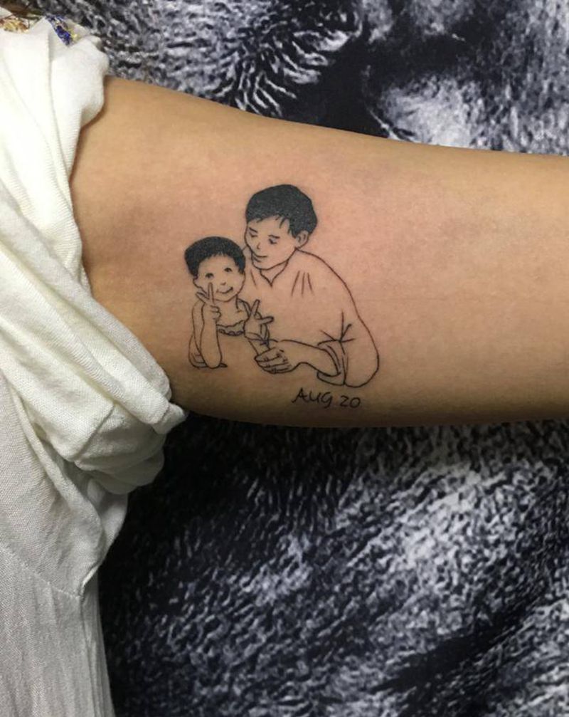 我与爸爸纹身图片_手臂人物纹身图案