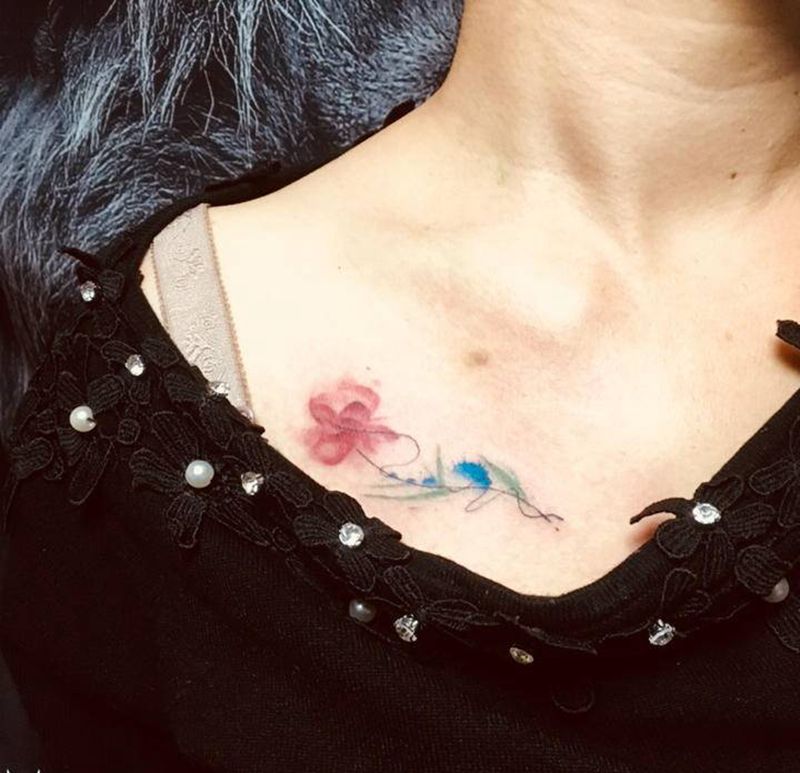 Me纹身图片_颈部胸部水彩纹身图案