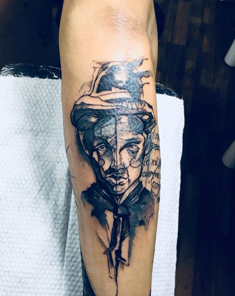 卓别林 式纹身图片_手臂水墨点刺甩针纹身图案