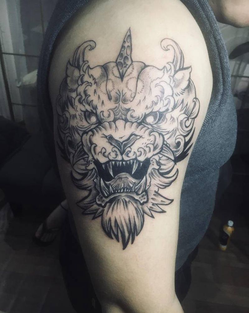 唐狮纹身图片_手臂纹身图案