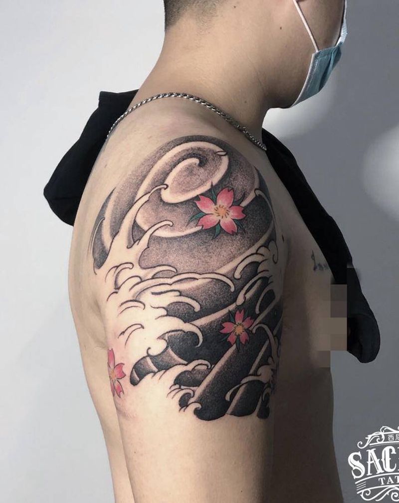 浪纹身图片_手臂老传统点刺浪纹身图案