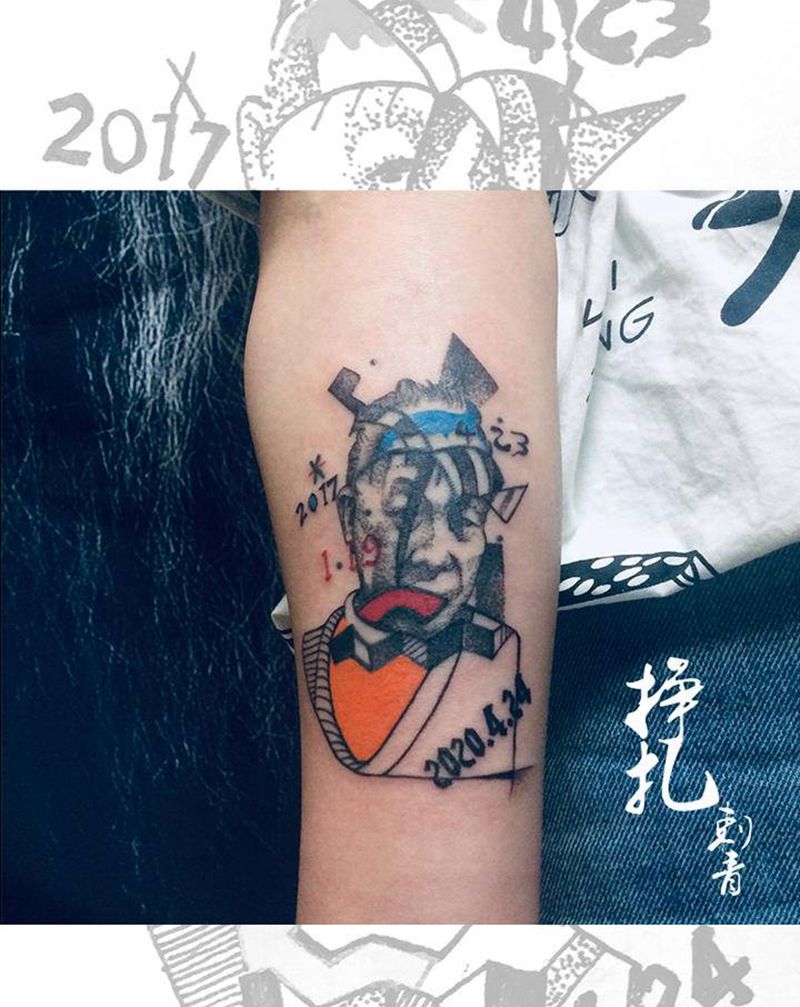 纪念纹身图片_手臂几何点刺人物艺术纹身图案