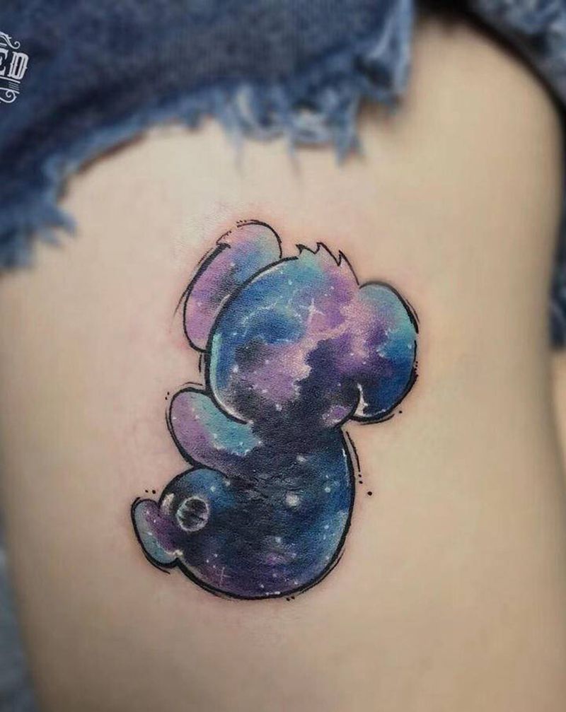 熊(遮盖)纹身图片_腿部水彩星空纹身图案