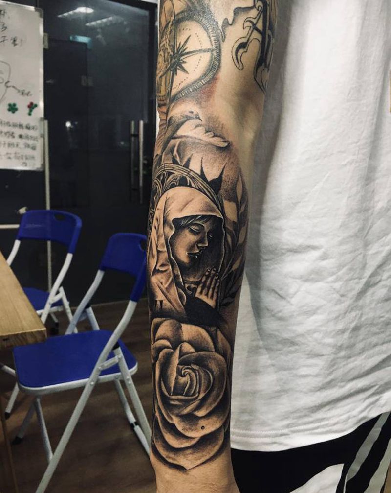 花臂拼接未完纹身图片_手臂纹身图案