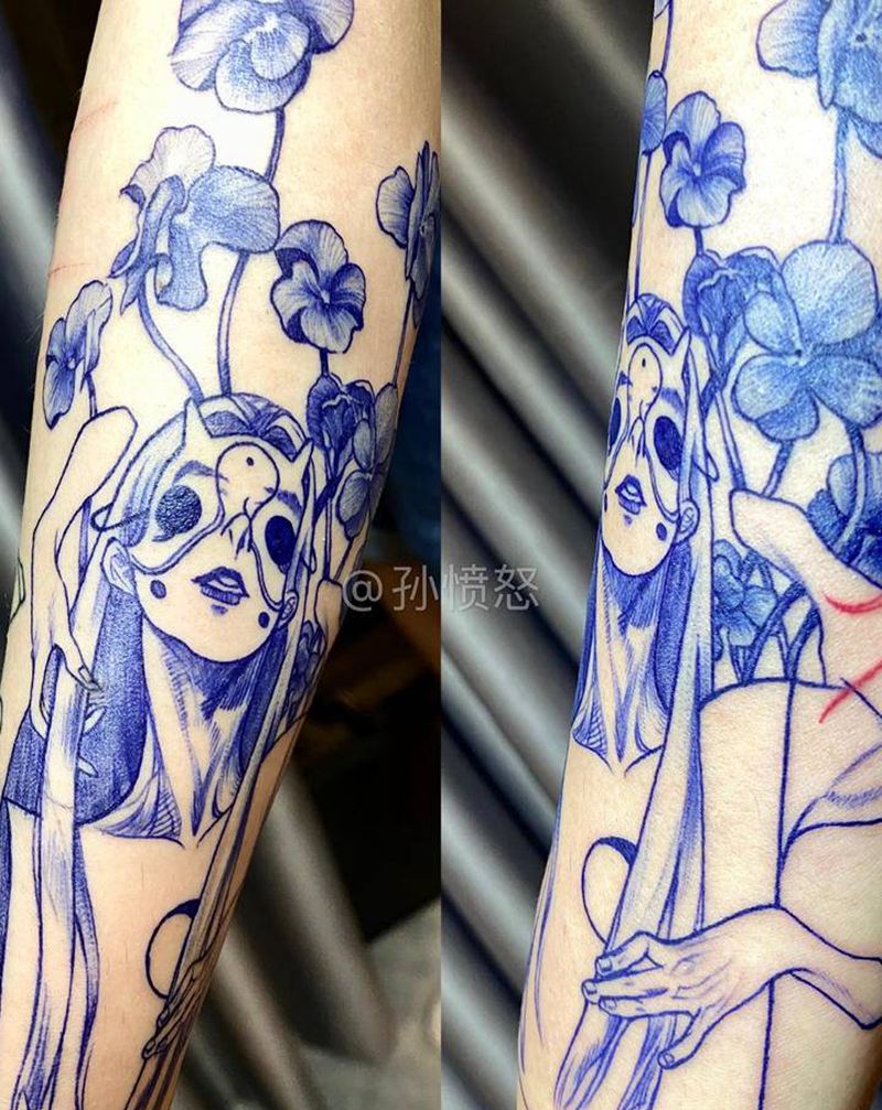 一抹蓝纹身图片_手臂纹身图案