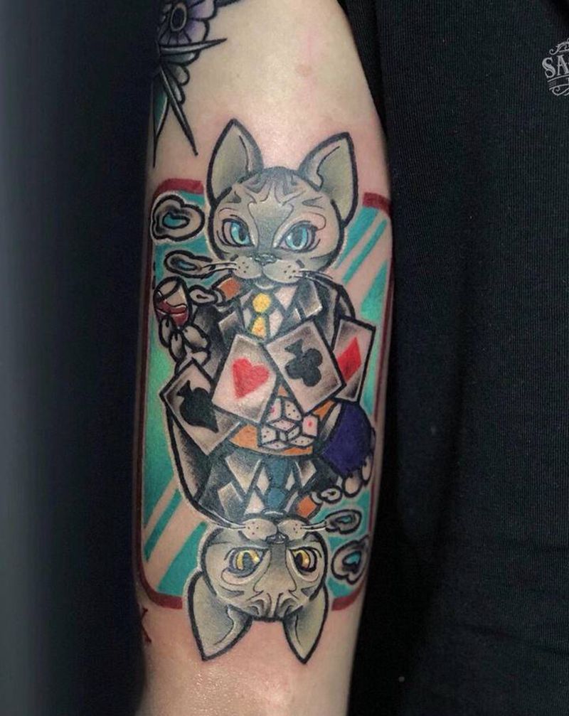 斯芬克斯扑克纹身图片_手臂New School无毛猫卡通纹身图案