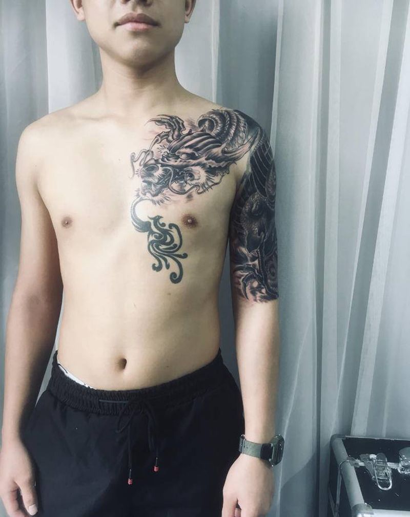 大臂遮盖完成纹身图片_手臂纹身图案