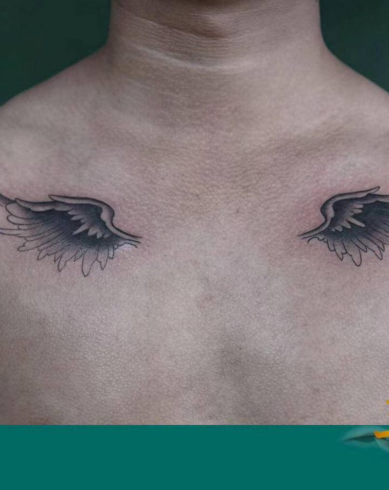 翅膀纹身图片_胸部纹身图案