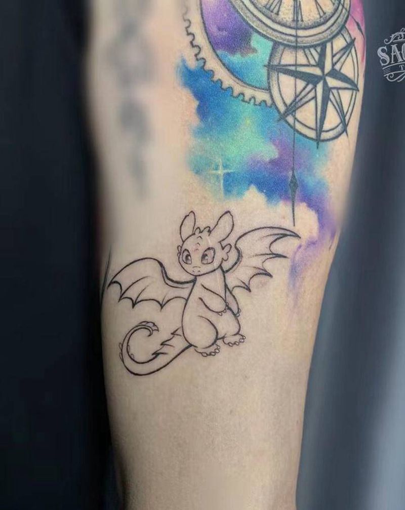 无牙仔纹身图片_手臂简笔画驯龙高手纹身图案